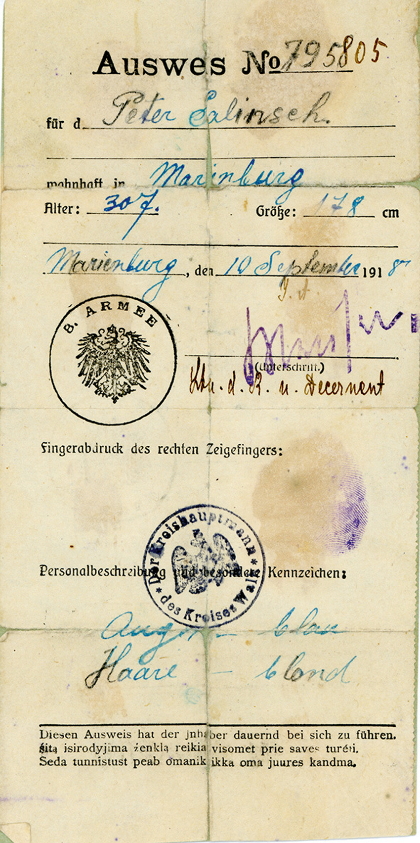 Vācijas 8. armijas izdota apliecība Pēterim Saliņam Alūksnē, izsniegta 1918. gada 10. septembrī. Šāda apliecība bija jāuzrāda, šķērsojot pagasta, muižas, pilsētas vai apriņķa robežas. Foto no Latvijas Kara muzeja krājuma