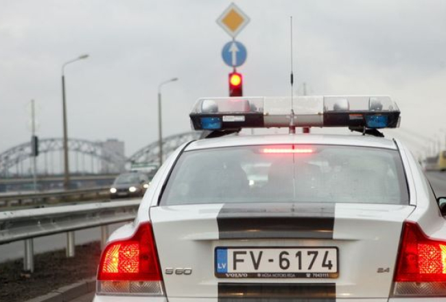 Policijas auto. Foto: Ieva Čīka, LETA