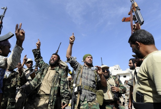 Lībijas varas cīņu uzvarētāji līksmo. Foto: AFP/LETA