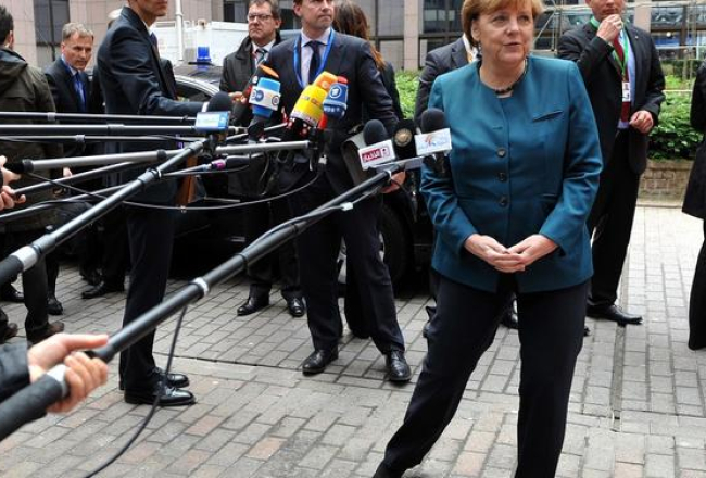 Vācijas kanclere Angela Merkele trešdien preses konferencē Briselē. Foto: AFP/LETA