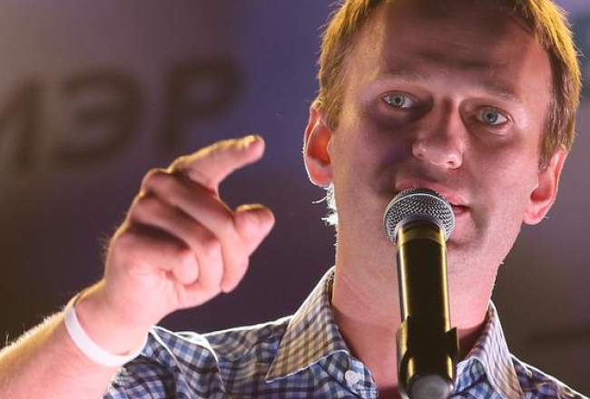 Opozīcijas līderis Aleksejs Navaļnijs mītiņā Bolotnajas laukumā. Foto: EPA/LETA