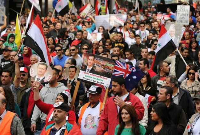 Sīrijas prezidenta Bašara al Asada atbalstītāji demonstrē Sidnejā Austrālijā. Foto: AFP/LETA