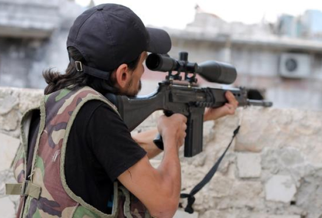 Sīrijas valdības spēku kareivis. Foto: AFP/LETA