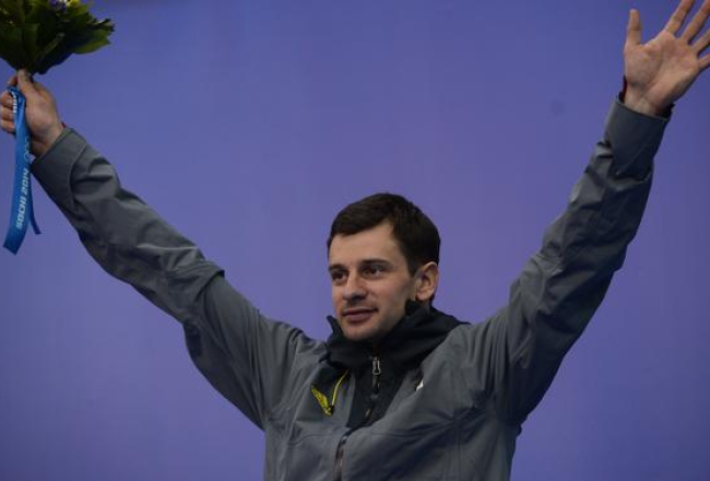 Foto: AFP. Latviešu skeletonists Martins Dukurs izcīna sudrabu Soču olimpiskajās spēlēs.
