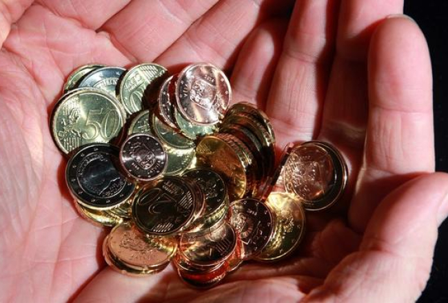 Latvijas eiro monētas. Foto: Ieva Čīka, LETA