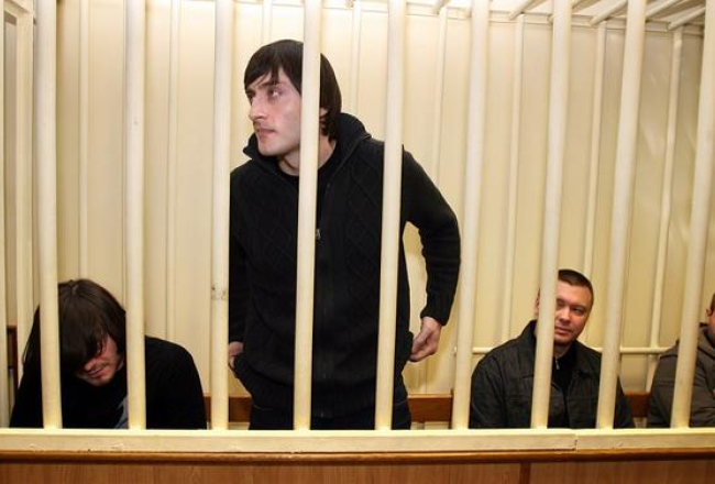Žurnālistes Annas Poļitkovskas slepkavībā apsūdzētie (no kreisās) - Džabrails Mahmudovs, Ibrahims Mahmudovs, Pāvels Rjaguzovs un Sergejs Hadžikurbanovs. Foto: AFP/LETA