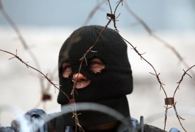 Prokrieviskais separātists Ukrainas austrumos. Foto: AFP/LETA