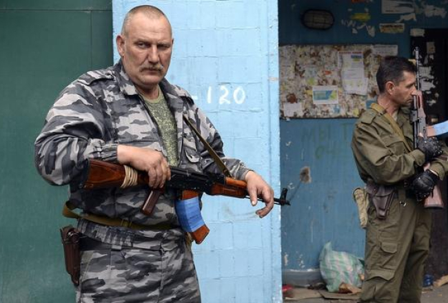 Prokrieviskie militāristi pozīcijās Luganskā. Foto: EPA/LETA