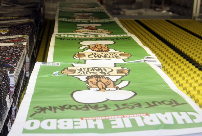 Jaunais žurnāla "Charlie Hebdo" numurs tipogrāfijā. Foto: EPA/LETA