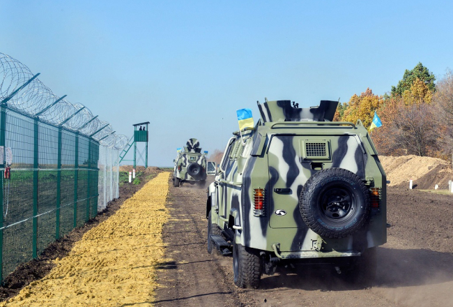 Ukrainas robežsargi pie robežas ar Krieviju. Foto: AFP/LETA