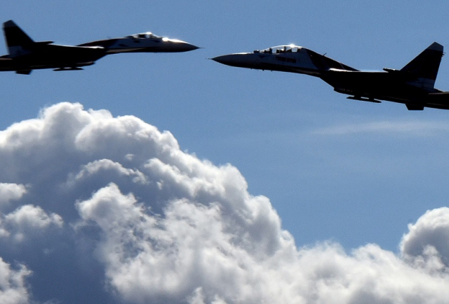 Krievijas militārās lidmašīnas SU-27. Foto: AFP/LETA