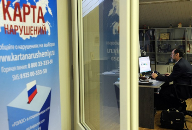 Organizācijas "Golos" birojā Maskavā. Foto: AFP/LETA