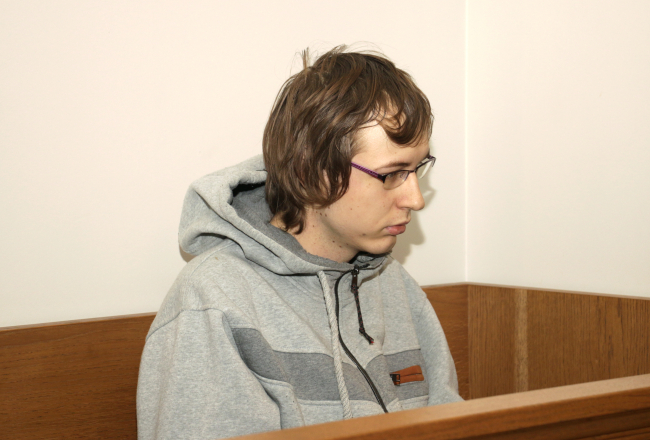 Par dalību Sīrijas konfliktā apsūdzētais Mārtiņš Grīnbergs pirmās instances tiesas sēdē. Foto: Paula Čurkste, LETA