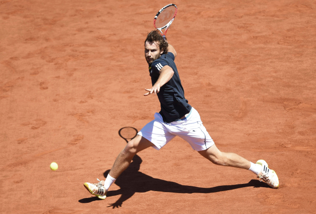 Ernests Gulbis Francijas atklātā čempionāta pusfināla spēlē pret Novaku Džokoviču 6.jūnijā