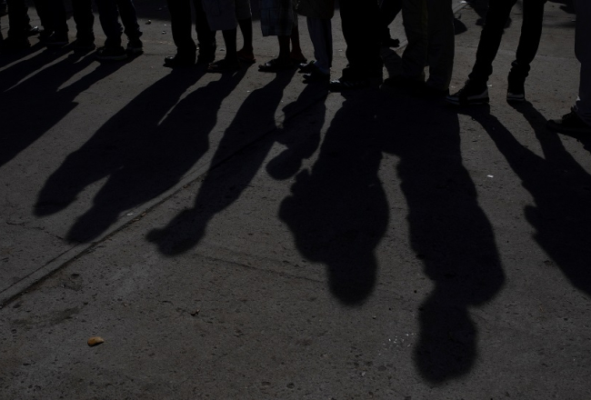 Migranti no Centrālamerikas mēģina nokļūt ASV. Foto: Reuters/Scanpix