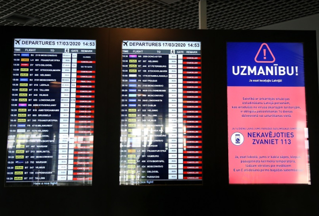 Jaunā koronavīrusa izraisītās slimības „Covid-19” izplatības mazināšanai uz ārkārtas situācijas laiku līdz 14.aprīlim apturēti visi starptautiskie avio reisi lidostā „Rīga”. Foto: Paula Čurkste, LETA