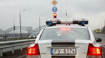 Policijas auto. Foto: Ieva Čīka, LETA
