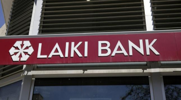 Kipras "Laiki" bankas izkārtne. Foto: AFP/LETA