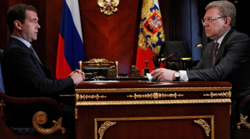 Krievijas prezidents Dmitrijs Medvedevs un finanšu ministrs Aleksejs Kudrins. Foto: AFP/LETA