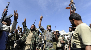 Lībijas varas cīņu uzvarētāji līksmo. Foto: AFP/LETA