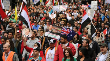 Sīrijas prezidenta Bašara al Asada atbalstītāji demonstrē Sidnejā Austrālijā. Foto: AFP/LETA