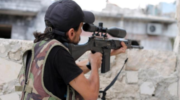 Sīrijas valdības spēku kareivis. Foto: AFP/LETA