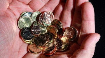 Latvijas eiro monētas. Foto: Ieva Čīka, LETA