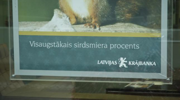 "Latvijas krājbankas" tā sauktais sirdsmiera reklāmas plakāts. Foto: Jānis Saliņš, F64