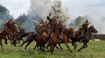 Pirms gada - Polijas armijas kaujas rekonstrukcija ar vācu uzbrucējiem 1939.gada septembrī. Foto: AFP/LETA