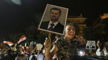 Sīrijā vēlētāji priecājas par Bašara al Asada ievēlēšanu prezidenta amatā. Foto: AFP/LETA