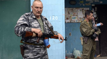 Prokrieviskie militāristi pozīcijās Luganskā. Foto: EPA/LETA