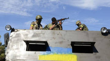 Ukrainas armijas bataljona "Dņipro" karavīri pie Novoazovskas. Foto: AFP/LETA
