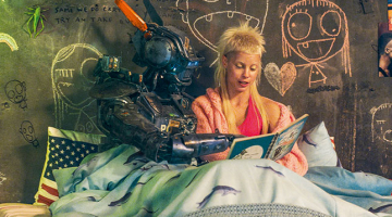 Robots Čapijs ar Jolandi Viseri, Dienvidāfrikā pazīstamu repa/reiva izpildītāju.