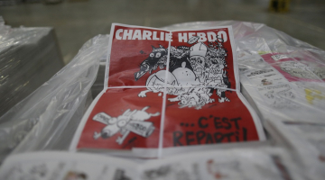 Jaunais žurnāla "Charlie Hebdo" numurs tipogrāfijā. Foto: AFP/LETA