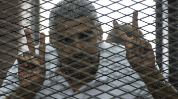 "Al Jazeera" žurnālists Muhameds Fahmijs Ēģiptes cietumā. Foto: AFP/LETA