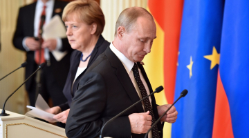 Krievijas prezidents Vladimirs Putins un Vācijas kanclere Angela Merkele kopīgajā preses konferencē. Foto: AFP/LETA