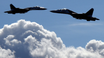 Krievijas militārās lidmašīnas SU-27. Foto: AFP/LETA