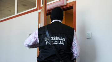 Drošības policijas darbinieks. Foto: Ieva Čīka, LETA