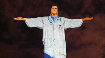 Uz Kristus statujas Riodežaneiro Lieldienās tika projicēts ārsta tērps.
Foto — Scanpix