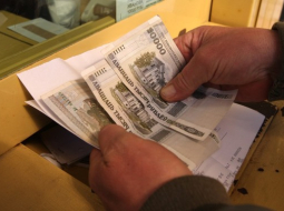 Attēlā: Valūtas maiņas punktā maina Baltkrievijas rubeļus. 