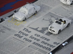 Londonas olimpisko spēļu noslēguma ceremonijas sākumā automobiļi gaida sākuma signālu. Foto: AFP/LETA