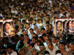 Gāztā prezidenta Muhameda Mursi atbalstītāji aizlūdz. Foto: EPA/LETA