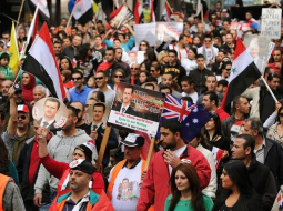 Sīrijas prezidenta Bašara al Asada atbalstītāji demonstrē Sidnejā Austrālijā. Foto: AFP/LETA