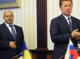 Ukrainas enerģētikas ministrs Jurijs Prodans (no kreisās) un "Gazprom" vadītājs Aleksejs Millers ierodas uz sarunām. Foto: EPA/LETA