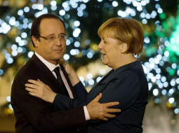 Vācijas kanclere Angela Merkele un Francijas prezidents Fransuā Olands. Foto: AFP/LETA