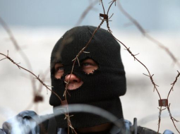 Prokrieviskais separātists Ukrainas austrumos. Foto: AFP/LETA