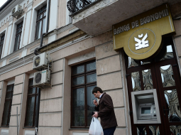 Moldovas "Banca de Economii", kuras bijušais padomes priekšsēdētājs ir Ilans Šors - tagad vainots bankas naudas izzagšanā. Foto: AFP/LETA