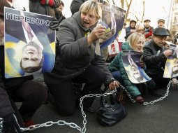 Ukraiņi protestē pret prezidentu Viktoru Janukoviču. Foto: AFP/LETA